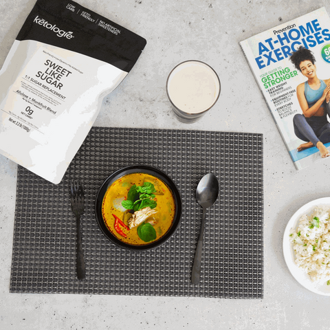 Sweet Like Sugar keto sweetener next to a meal and fitness magazine.
