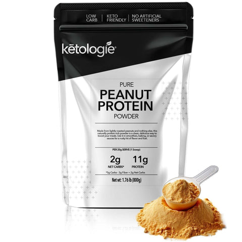 Powdered peanut butter in black and white packaging with scoop on display.