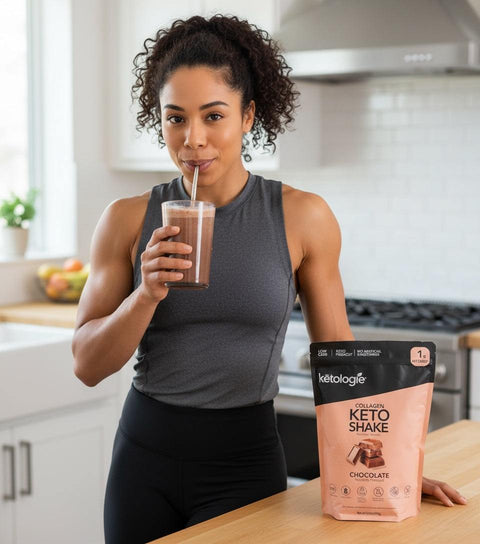 Woman drinking chocolate collagen keto shake in modern kitchen next to product package