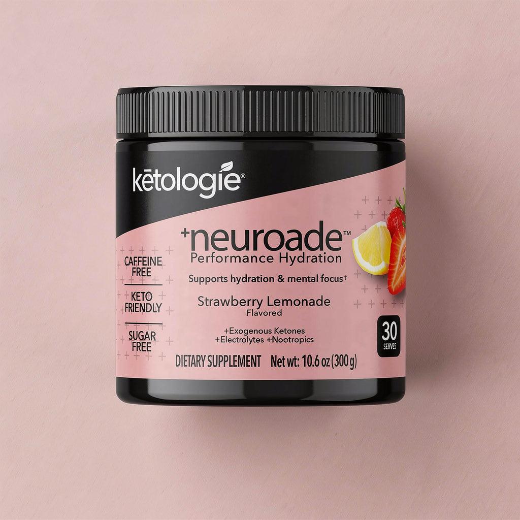 Neuroade™ Strawberry Lemonade hydration mix with electrolytes and focus blend in scoop and glass of water