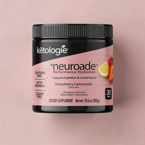 Neuroade™ Strawberry Lemonade hydration mix with electrolytes and focus blend in scoop and glass of water